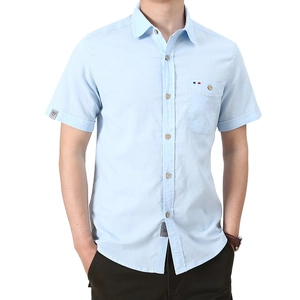 Men's light blue short sleeve cotton shirt with chest pocket and professional casual fit