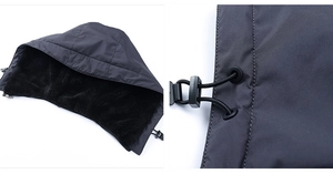 Detail of adjustable hood drawstring and thick black fleece lining for winter jacket