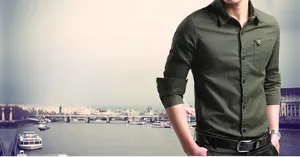 Close-up detail of military green slim fit cotton long sleeve shirt with chest pocket