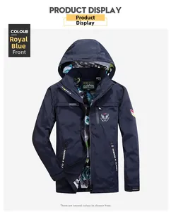 Detailed front view of royal blue hooded windbreaker with chest logo and camo lining