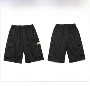 Detailed front and back view of black cargo shorts with elastic waist and flap pockets