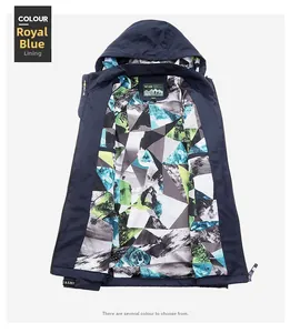 Detail of royal blue hooded jacket featuring grey and yellow geometric pattern lining