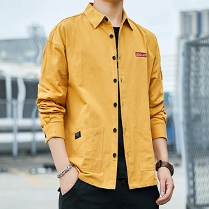 Men's mustard yellow long-sleeve work shirt with dual pockets and loose-fit cotton texture