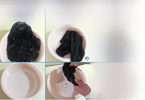 Close-up showing the colorfastness test of a black cotton shirt in water for thirty minutes