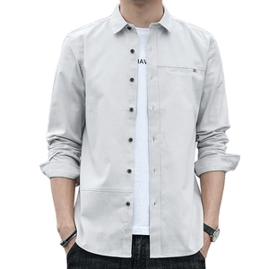 Men's light grey long sleeve casual shirt with buttoned chest pocket and stylish trim