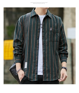 Detailed texture of men's dark green striped long-sleeve shirt with a small chest pocket