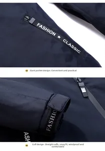 Detail of navy blue jacket with zipper pocket and adjustable velcro cuffs for men