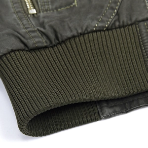 Olive green cotton jacket for men featuring ribbed cuffs and a metallic zipper detail