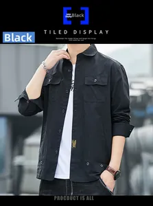 Detail of black military style cotton shirt jacket featuring classic chest flap pockets