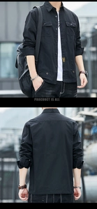 Detailed view of black military style cotton shirt jacket with double breast pockets