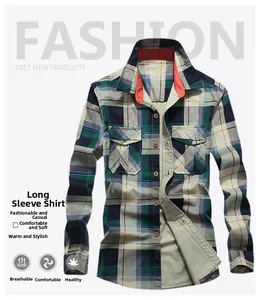 Detail of men's long sleeve plaid shirt with double chest pockets and red collar lining