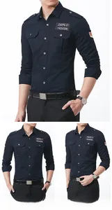 Detail view of deep blue military cotton shirt with double chest pockets and epaulettes