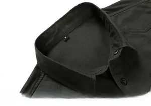 Detail of olive green men's slim fit cotton shirt collar with M size label