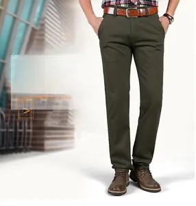 Detail showing high-quality stretch cotton fabric on men's slim fit olive casual chinos