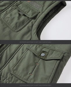 Close-up of olive green outdoor vest showing fleece lining and pocket embroidery