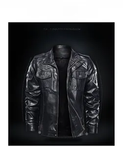 Detail of black faux leather motorcycle jacket featuring epaulettes and chest badges