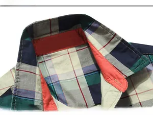 Detail shot of men's cotton plaid shirt collar with high-quality stitching and fabric