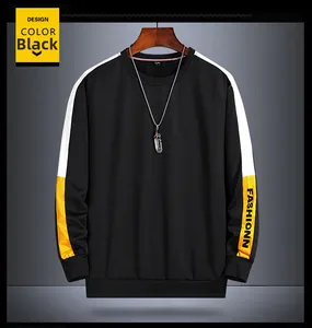 Detail showing high-quality black sweatshirt with contrast white stripes and fashion print
