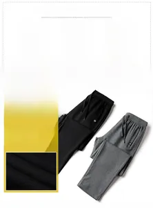 Detail of men's casual cotton jogger pants showing elastic drawstring waist and fabric texture
