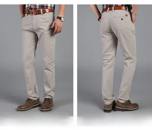 Detail view of khaki casual trousers showing front zipper and back welt pocket design