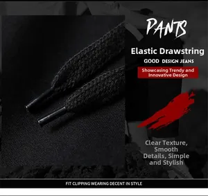 Close-up of the elastic drawstring with durable cylindrical caps on black cotton pants