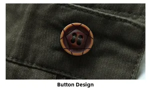 Close-up of vintage brown button with geometric patterns on olive twill casual pants