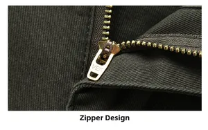 Detail view of high-quality metal zipper and twill fabric on men's casual pants