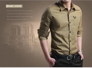 Detail of khaki cotton shirt featuring utility chest pockets and roll-up sleeve tabs