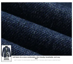Vista macro dettagliata della trama del tessuto twill blu navy per blazer da uomo in cotone