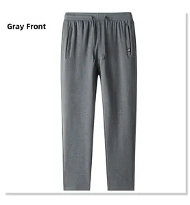 Detail view of men's grey casual cotton pants showing drawstring waist and side pockets