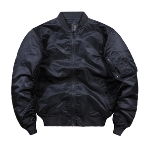 Detail of classic black MA-1 flight jacket with ribbed collar and utility arm pocket
