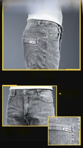 Detailed close-up of grey denim jeans featuring a stylish back pocket and metal button accents