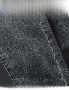 Macro shot of high-density cotton denim fabric showing the premium twill texture