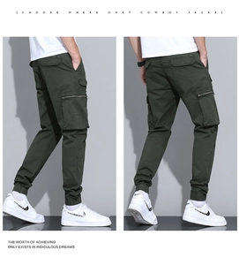 Detailed side view of deep green cargo joggers with tactical zipper pockets and ribbed cuffs