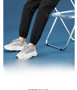 Detail view of breathable black cargo pants with elastic cuffs and skin-friendly fabric