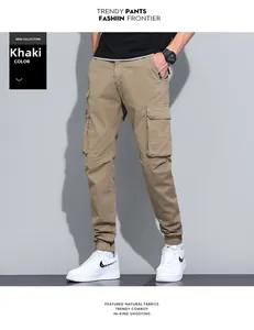 Detail view of khaki cotton cargo pants with side pockets and elastic ankle cuffs
