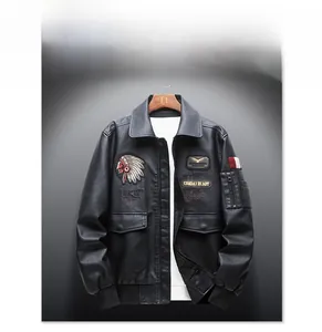 Detailed close-up of military patches and Indian chief embroidery on a black PU leather jacket