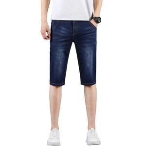 Men's slim straight denim shorts in dark blue with whiskers and classic five-pocket style