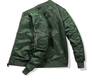 Detail view of military green flight jacket featuring sleeve zipper pocket and ribbed cuffs