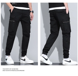 Front and back detail of black cargo joggers with zipper pockets and buckled waist belt