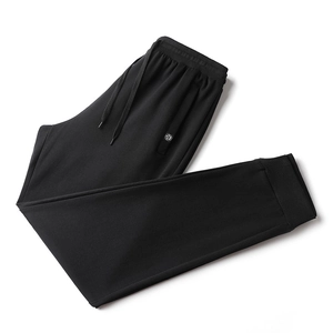 Pantalon de jogging en coton noir pour hommes avec cordon de serrage et logo floral