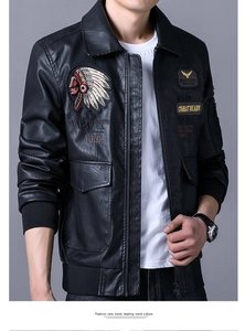 Detailed close-up of military patches and embroidery on men's black PU biker jacket