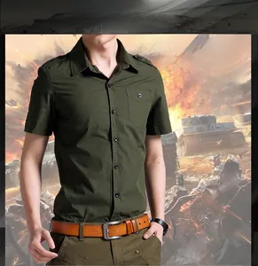 Detailed view of army green cotton shirt with military shoulder epaulettes and chest pocket