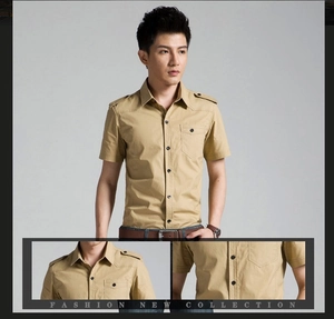 Detail view of khaki cotton military shirt featuring shoulder epaulettes and a chest pocket