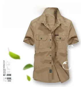 Detailed flat lay of khaki men's short sleeve work shirt with classic lapel and dual pockets