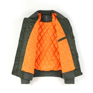 Army green bomber jacket with orange quilted lining shown in a flat lay view