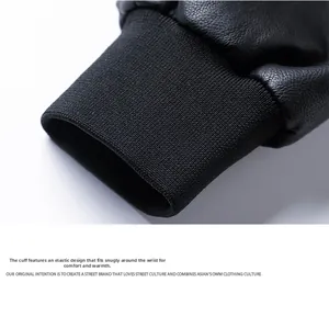 Close-up of black PU leather jacket cuff with ribbed elastic knit for windproof warmth