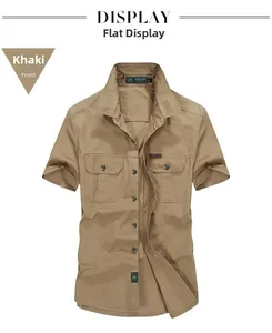 Detail view of khaki short sleeve work shirt with front utility pockets and spread collar