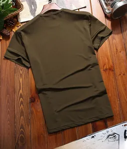 Close-up of olive green military cotton T-shirt with breathable mesh texture