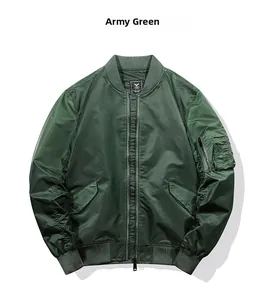 Detail of army green MA1 bomber jacket featuring utility sleeve pocket and ribbed collar